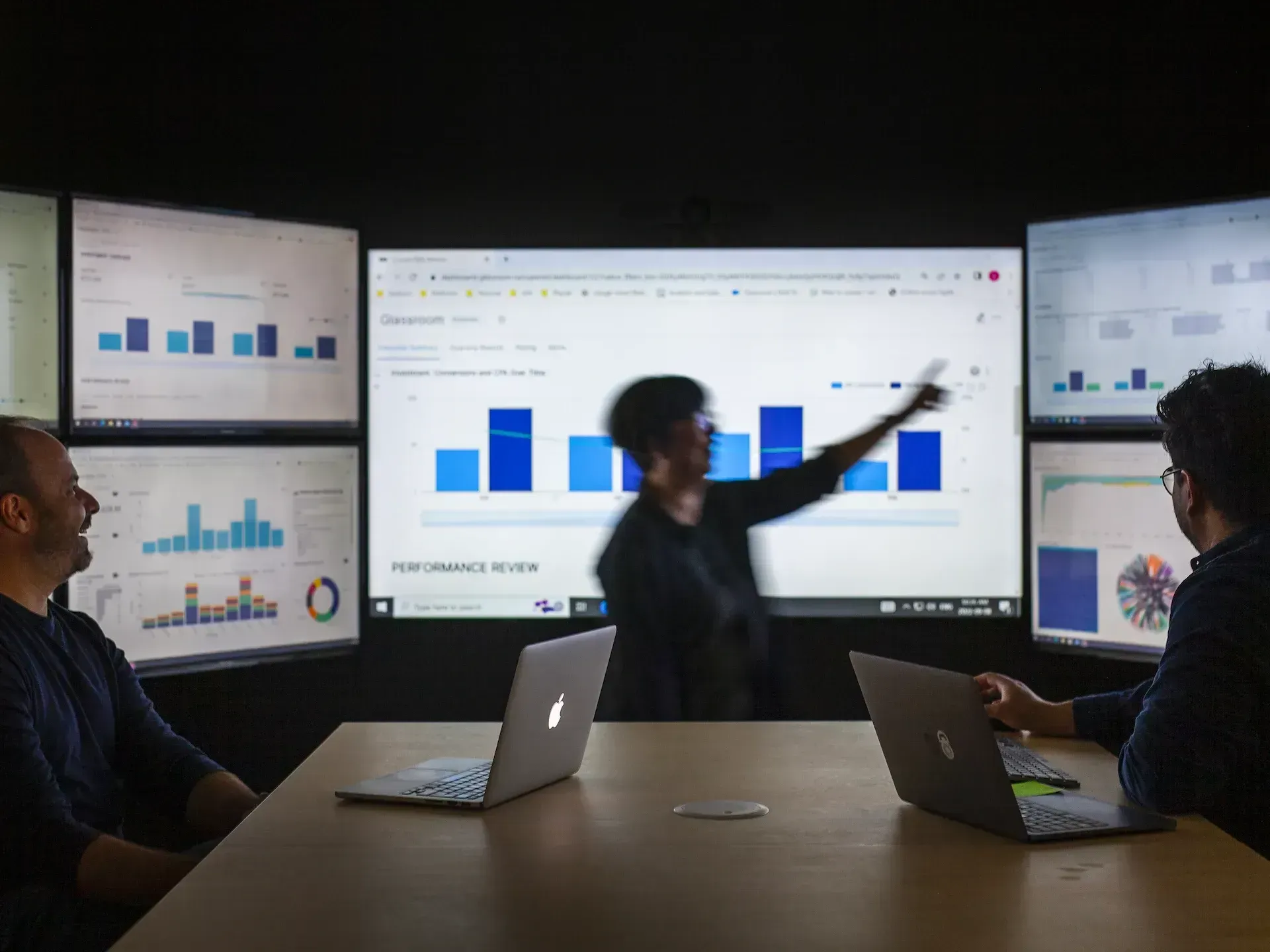 people looking at a pc