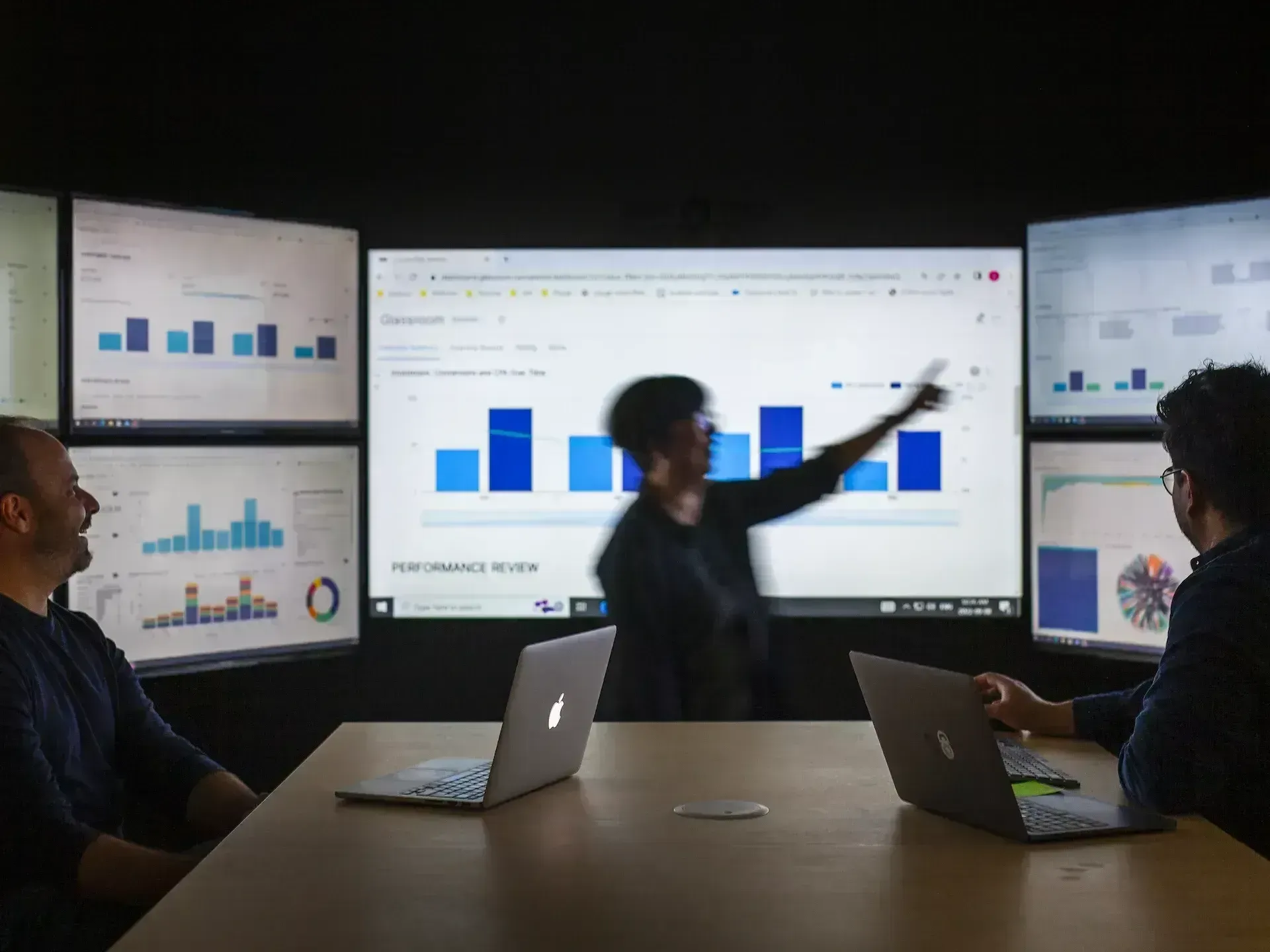 people looking at a pc